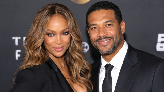 Tyra Banks and Greg Hayes